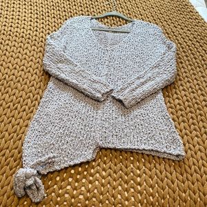 Asymmetrical bubble sweater